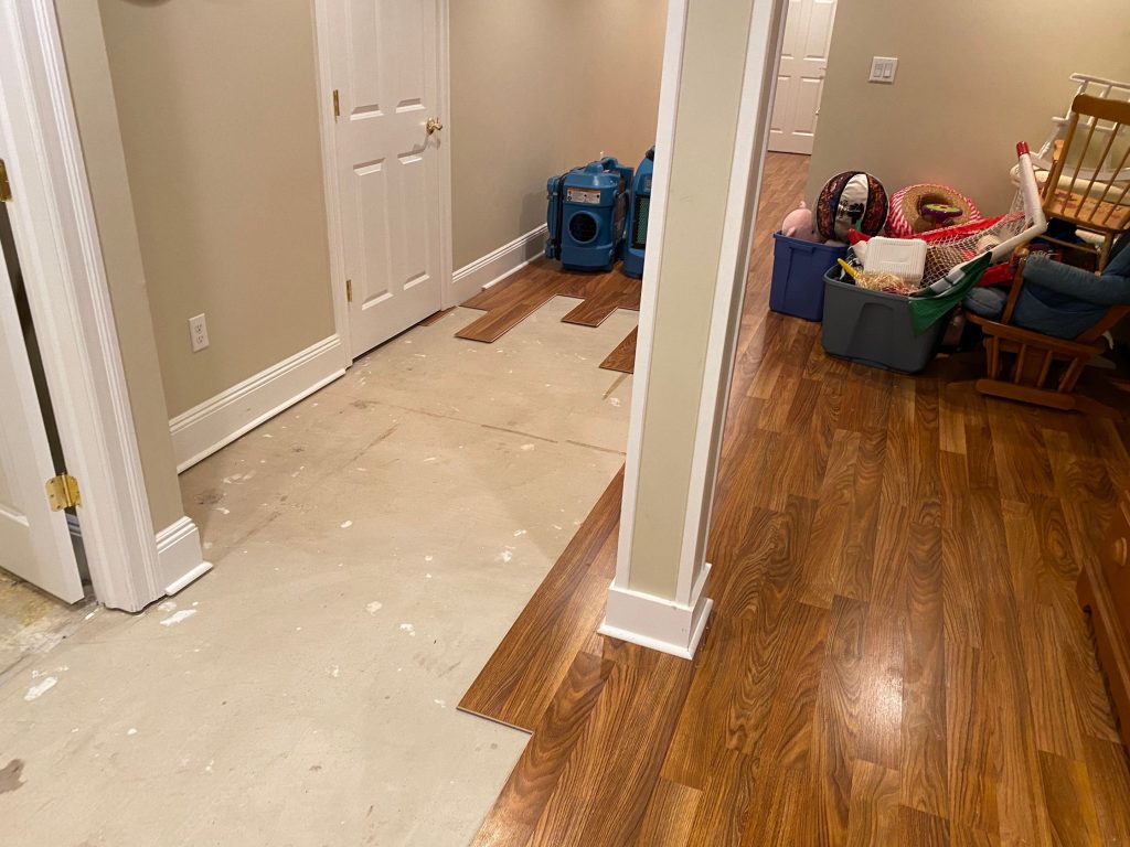 Water damage occurring due to backflow of sewage in the basement